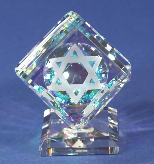 Judaica Single Dichroic Crystal Cubes. These optically pure crystal cubes sparkle and glow even in low light. This special cube features the Jewish The Chai, Tora, & Star of David.