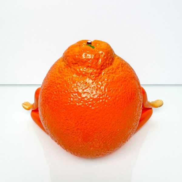 Tangelohm from the Out of the Bowl Series by Thad Markham. A peaceful orange practicing yoga and finding inner peace.