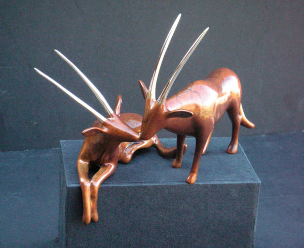 Oryx Pair Sculpture 501 by Loet Vanderveen, shown in the marbled amber patina.