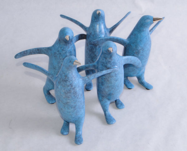 Small Penguin Group Sculpture 377 by Loet Vanderveen shown in Arctic Blue.