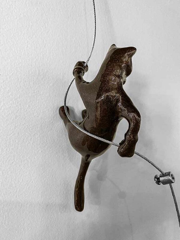 Brown Wall Climber Sculpture