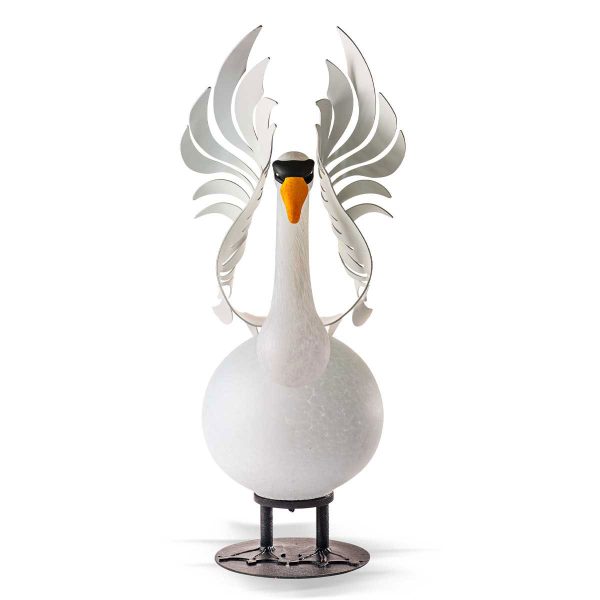 Hektor is a large, outdoor glass sculpture of a trumpeter swan. white body and head, metal raised wings and feet.