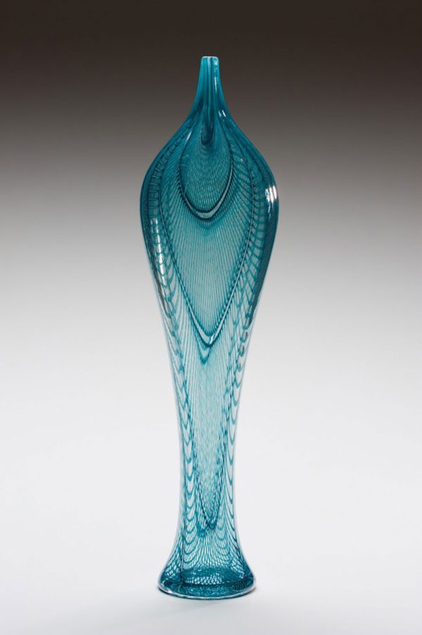 Sage Iris vessel from the Diva Series by American glass artist Kenny Pieper. 25 inch tall glass vessel with intricate teal or sage blue linework.