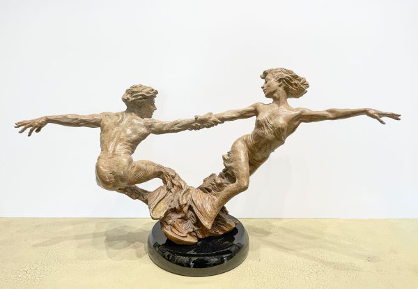Whirlwind by Martin Eichinger - man and woman dancers holding hands spinning with hands outstretched. Bronze sculpture on polished granite base.