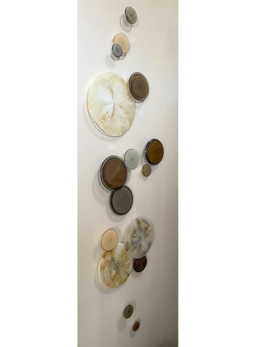 Serenity by LouAnn Wukitsch at Art Leaders Gallery. Glass circle wall sculpture with neutral colors of brown, whites, creams, and gold.