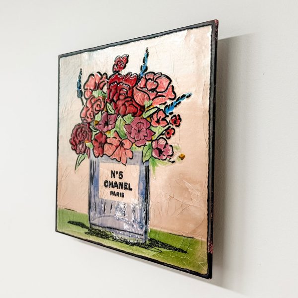 Love Affair - Houston Llew limited. Copper enamel panel of illustrated flowers over a purple Chanel No5 bottle.